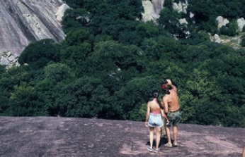 Enchanted couple on rock